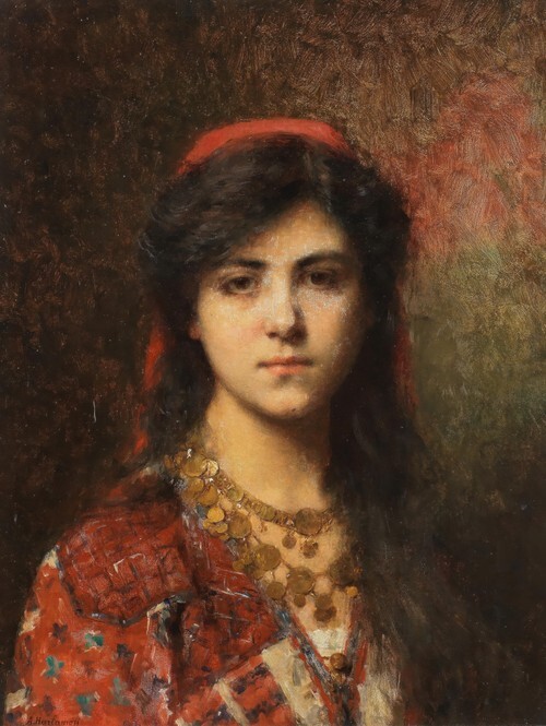 Portrait of a young girl bust length, wearing a red headscarf and an exotic gold necklace