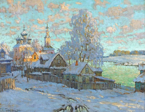 A snow-covered village in the sun