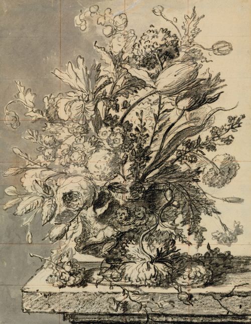 A bouquet of flowers in a terracotta vase resting on a ledge