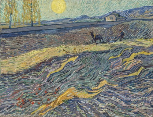 The farmer plowing in the field