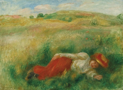 Donna sdraiata nell'erba