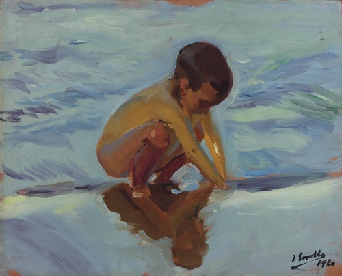Backlight on the Beach. Crouching Boy