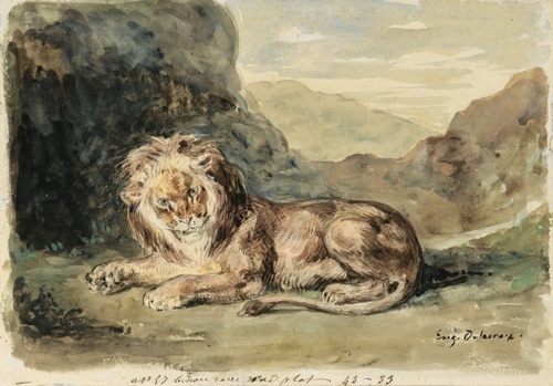 Lying lion in a landscape