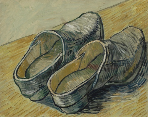 A pair of leather clogs