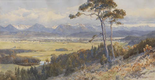 View of Klagenfurt in front of the Karawanken Mountains