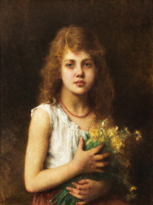 Young girl with a bunch of marguerites