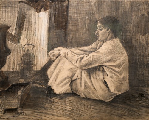 Woman seated near the stove