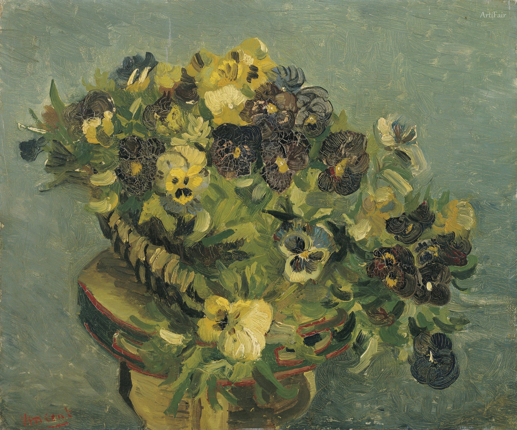 Basket of pansies on a small table