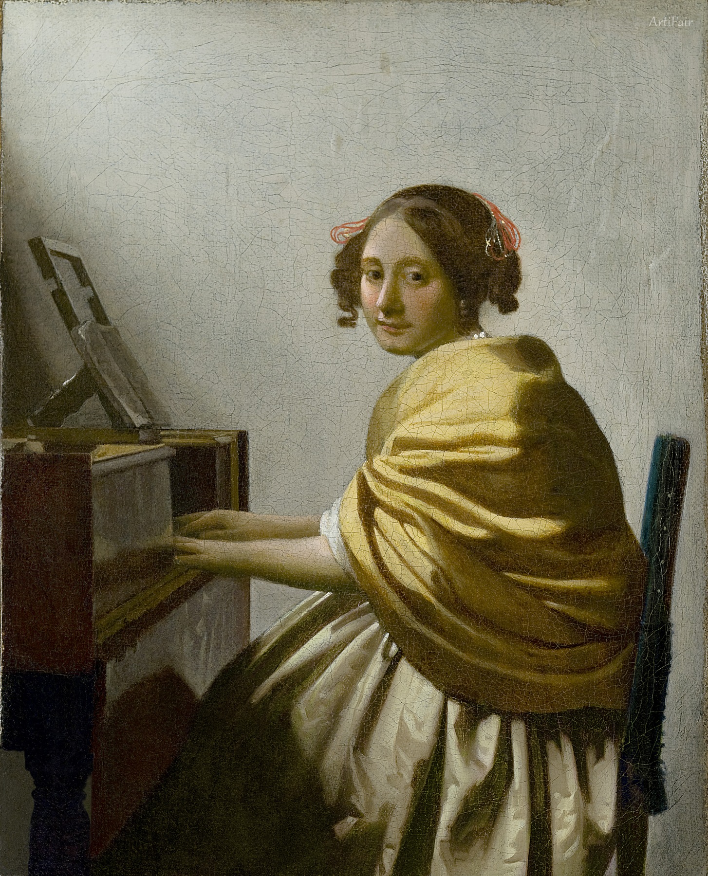 Young Woman Seated at a Virginal