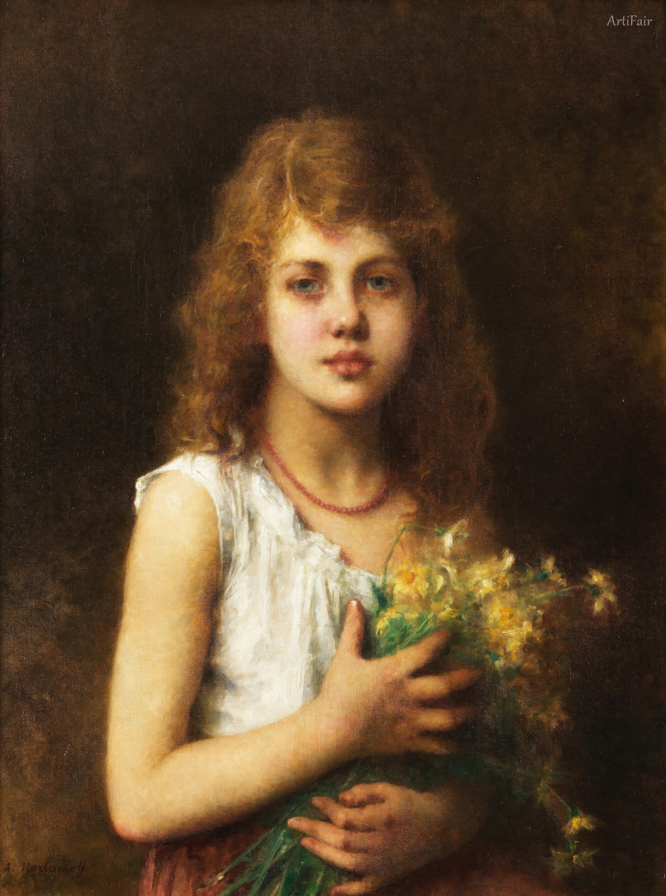Young girl with a bunch of marguerites